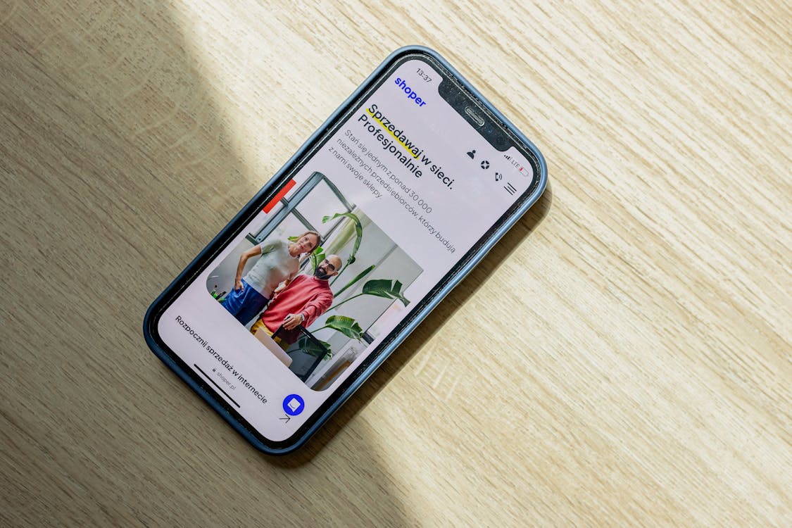 Smartphone user checking a business website on their phone